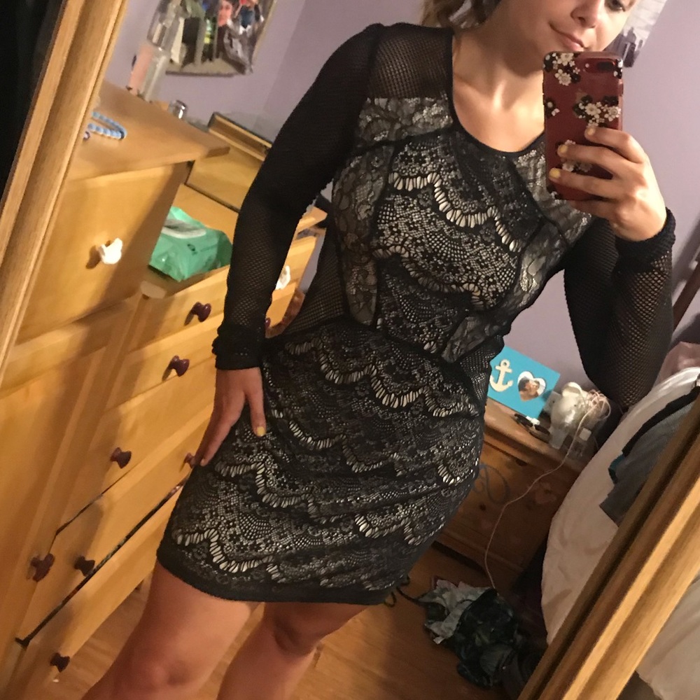 Black and nude cut out dress